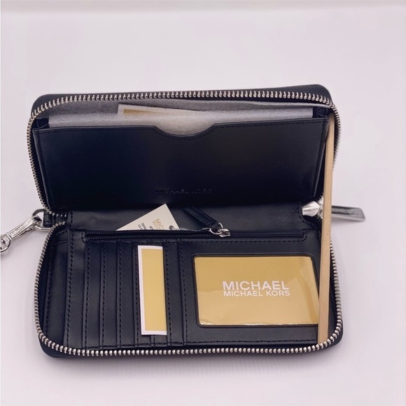 Michael Kors Jet Set Travel Large
Flat Zip MF Phone Case Wristlet
Wallet - Picture 5 of 11